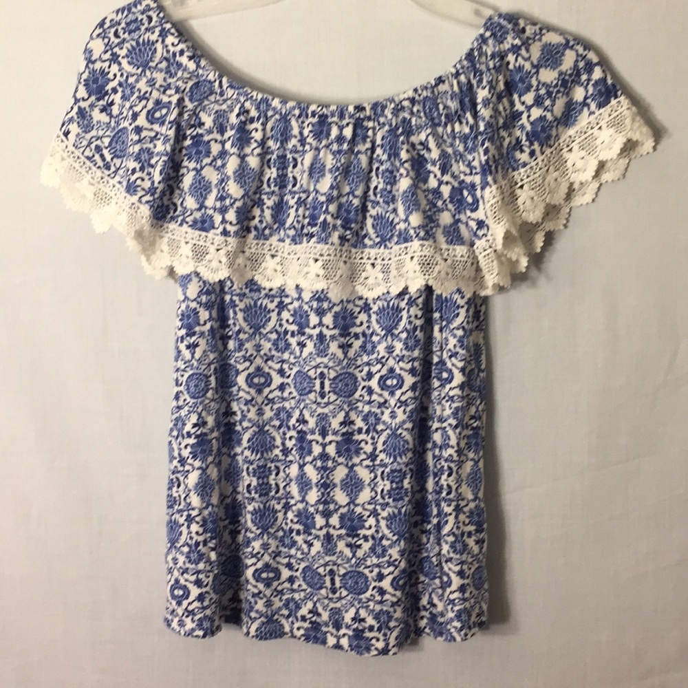 Beautiful off the shoulder or on the shoulder top